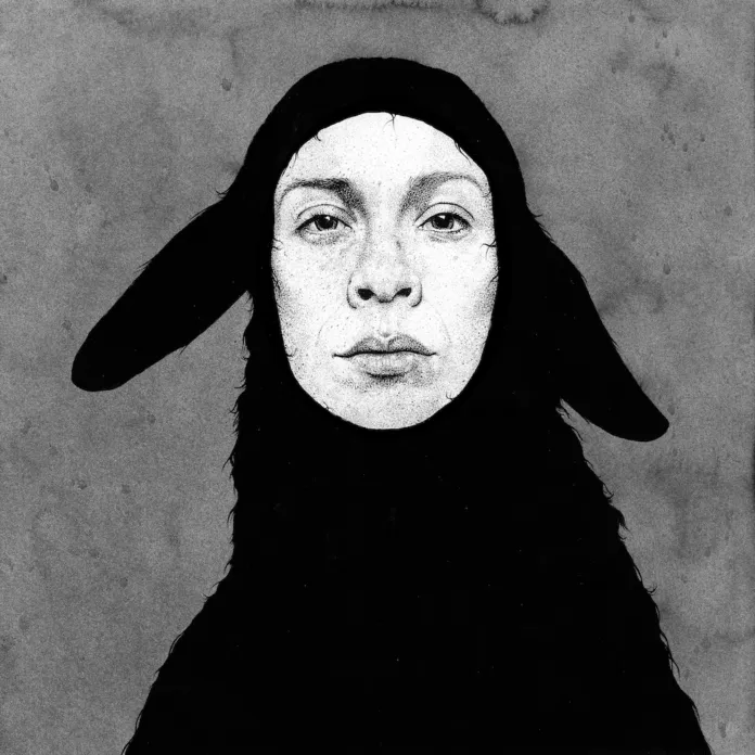 Ritratto in bianco e nero di una persona con un copricapo nero dotato di due appendici laterali simili a orecchie.